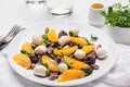 Unforgettably delicious fruit salad with olive oil and mozzarella