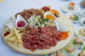 Unformal fourchette table with french fries and sausage