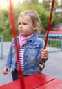 The unfortunate little girl on the playground