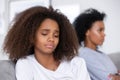 Unhappy African American teen girl having problem with strict mother Royalty Free Stock Photo