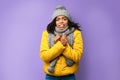 Unhappy African Girl Freezing Wearing Winter Clothes Over Purple Background Royalty Free Stock Photo