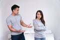 Unhappy Asian Couples standing beside each other and women avoid talking or quarrel, Cause of angry, quarrel, relationship Royalty Free Stock Photo