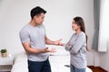 Unhappy Asian Couples standing beside each other and women avoid talking or quarrel, Cause of angry, quarrel, relationship Royalty Free Stock Photo