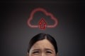 Unhappy Asian woman and cloud icon hologram effect