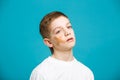 Unhappy boy with adhesive plaster on his cheek Royalty Free Stock Photo