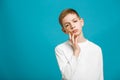 Unhappy boy with adhesive plaster on his cheek Royalty Free Stock Photo