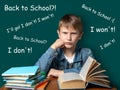 Unhappy boy of European appearance is sitting on the background of the school green board. Teen does not want to school. A stack