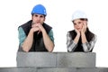 Unhappy bricklayers Royalty Free Stock Photo