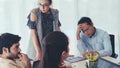 Unhappy business people in group meeting. Royalty Free Stock Photo