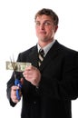 Unhappy Businessman Cutting Dollar Bill Royalty Free Stock Photo