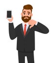 Unhappy businessman holding/showing brand new smartphone, mobile, cell phone in hand and gesturing thumbs down sign. Human emotion Royalty Free Stock Photo