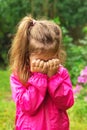 Unhappy Child is crying outdoors