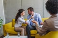 Young married couple at their counselor. Marriage problems. Fighting Royalty Free Stock Photo