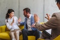 Young married couple at their counselor. Marriage problems. Fighting Royalty Free Stock Photo