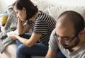 Unhappy couple arguing on the sofa Royalty Free Stock Photo