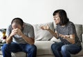 Unhappy couple arguing on the sofa Royalty Free Stock Photo