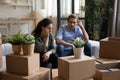 Unhappy couple have fight on moving day to new home Royalty Free Stock Photo