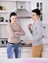 Unhappy couple in the kitchen