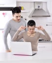 Unhappy couple in the kitchen Royalty Free Stock Photo