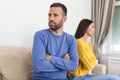 Unhappy couple not talking after an argument at home . unhappy couple not speaking after having argument. Young couple in fight Royalty Free Stock Photo