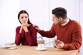 Unhappy couple with relationship problems at table Royalty Free Stock Photo