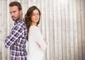 Unhappy couple standing back to back Royalty Free Stock Photo