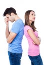 Unhappy couple standing back to back Royalty Free Stock Photo