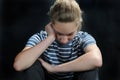 Unhappy weeping teenager girl feels lonely