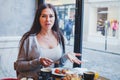 Unhappy customer in restaurant, angry woman