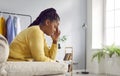 Unhappy depressed young woman touching her head feeling despair Royalty Free Stock Photo