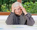 Unhappy elderly woman