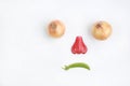 Unhappy face looking up of fresh fruit and vegetables isolated on a white background Royalty Free Stock Photo