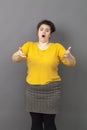 Unhappy fat young woman complaining for overweight stress