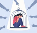 Unhappy female character locked in cage. Fingers pointing on sad girl. Concept of bullying and violence in society. Victim woman. Royalty Free Stock Photo