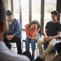 Unhappy Female Pupil In High School Discussion Group Royalty Free Stock Photo