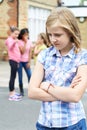 Unhappy Girl Being Gossiped About By School Friends Royalty Free Stock Photo