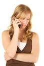 Unhappy girl phoning Royalty Free Stock Photo