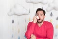 Unhappy ill man having a cold Royalty Free Stock Photo