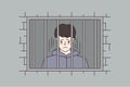 Unhappy man convict behind bars in jail Royalty Free Stock Photo