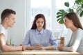 Unhappy married couple sitting opposite getting divorced in lawyer office Royalty Free Stock Photo