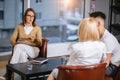 Unhappy married couple talking to family counselor before breaking up Royalty Free Stock Photo