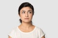 Unhappy Indian woman look in distance thinking Royalty Free Stock Photo