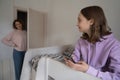 Worried mom control teenage daughter gadget use