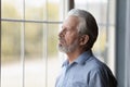 Unhappy older man look in distance feeling lonely Royalty Free Stock Photo
