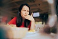 Woman Feeling Sick and Disgusted by Food Course in a Restaurant Royalty Free Stock Photo