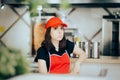 Tired Female Fast Food Worker Resting on a Chair