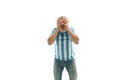 The unhappy and sad Argentinean fan on white background Royalty Free Stock Photo