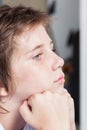 Unhappy sad boy, face close up stressed child Royalty Free Stock Photo