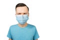 Unhappy, sad person, wearing a protective face mask prevent virus infection or pollution on white isolated background Royalty Free Stock Photo
