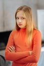 Unhappy serious girl standing cross handed Royalty Free Stock Photo